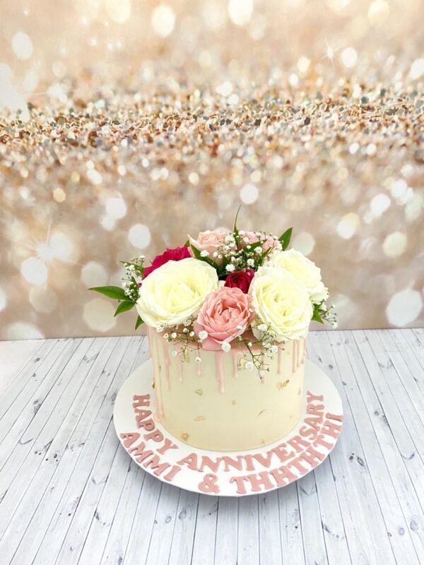 Fresh flowers drip cake Rs8500-1.5kg Fresh Flowers Drip Cake