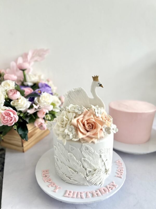 Swan theme cake with sugar roses 1.5kg Rs10,000 Swan Theme Cake with Sugar Roses